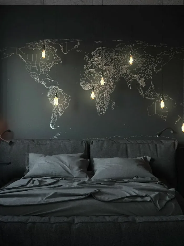 Dark bedroom with a lit world-map feature wall